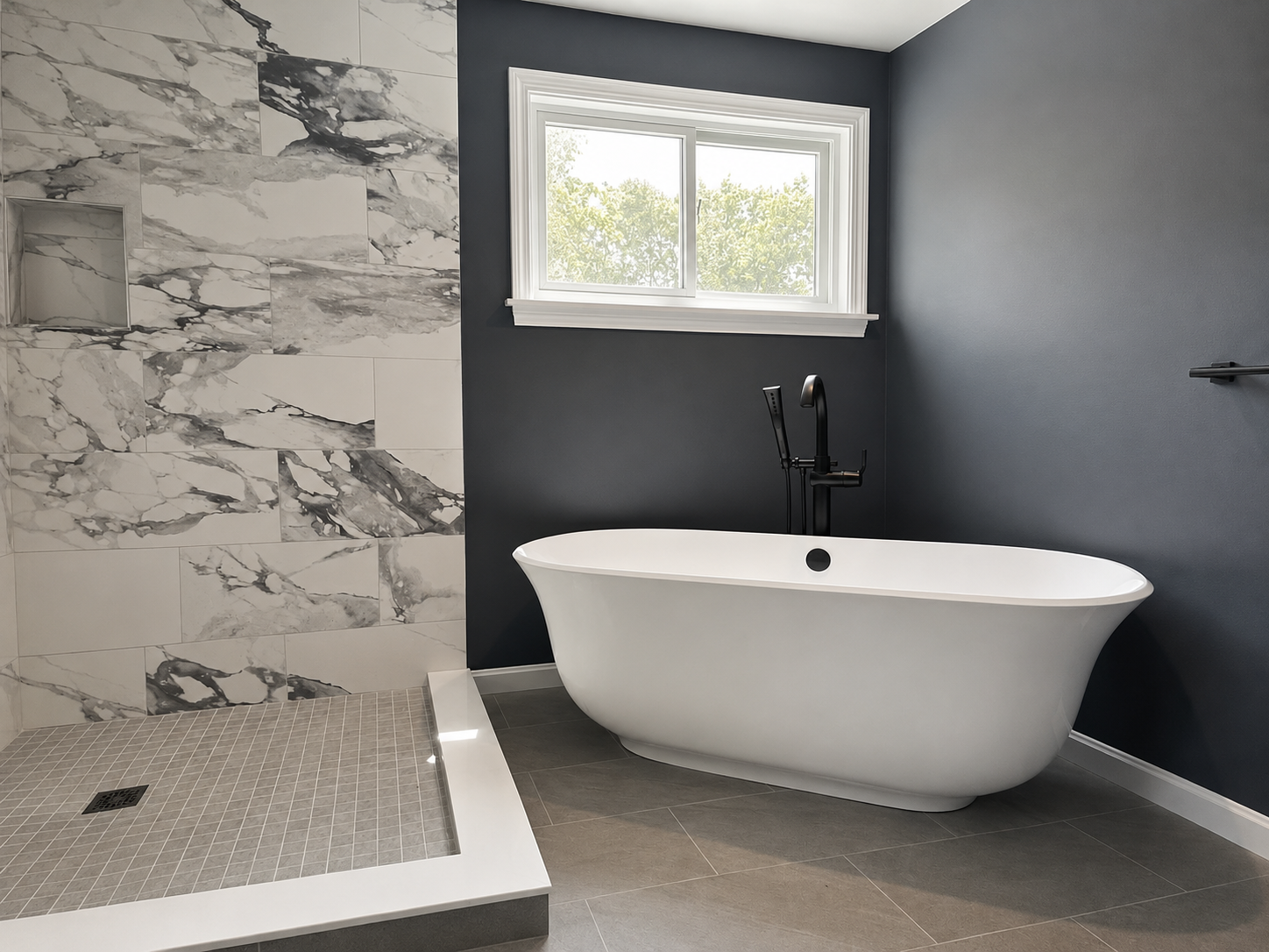 Modern bathroom remodeling project with freestanding tub and tiled shower in Cape Cod