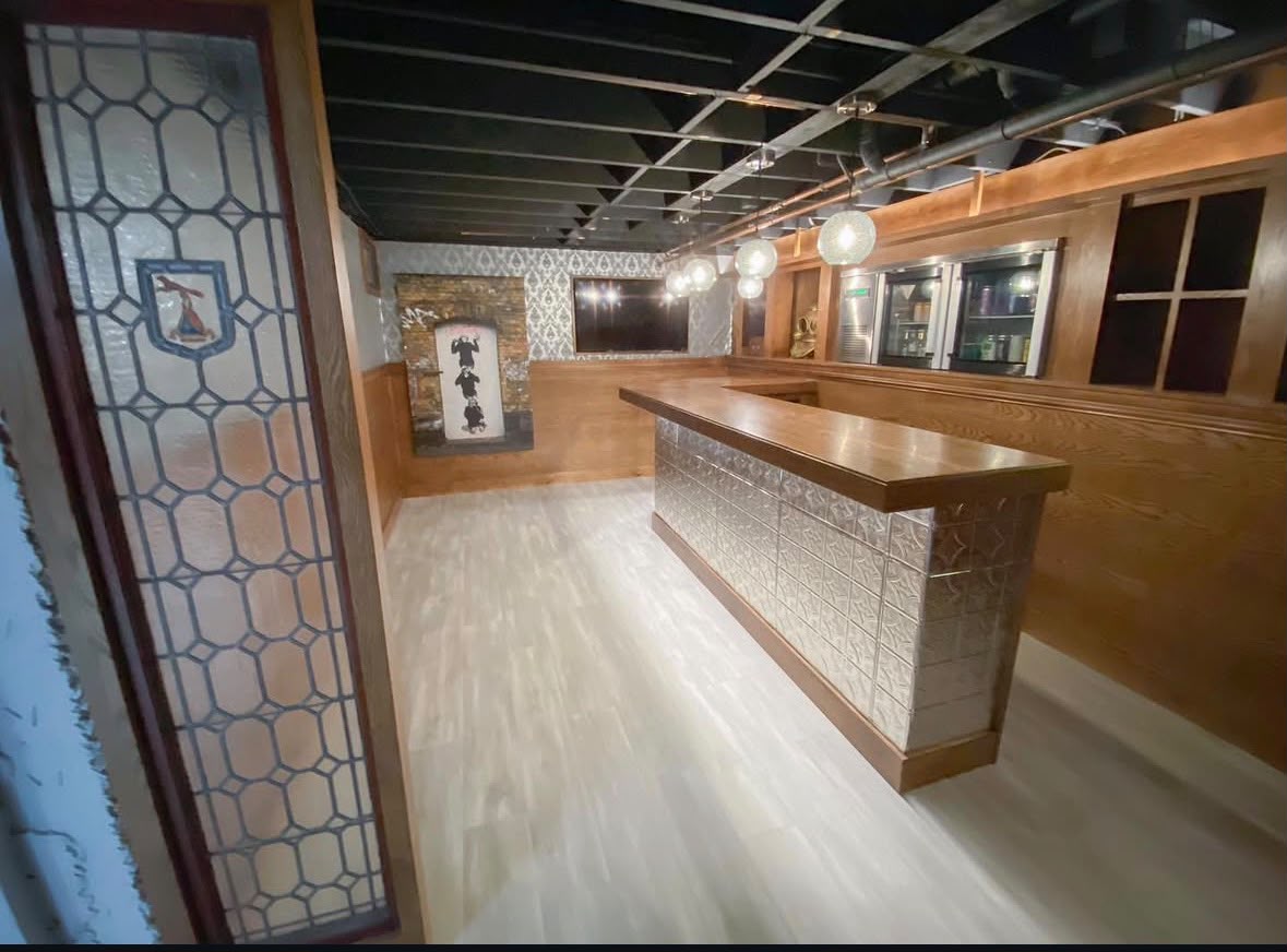 Custom built residential wood bar and cabinetry