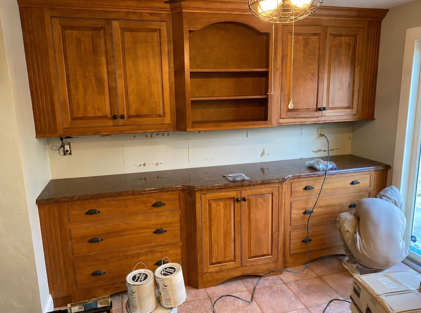 Butcher block countertop installation in progress in a Cape Cod kitchen