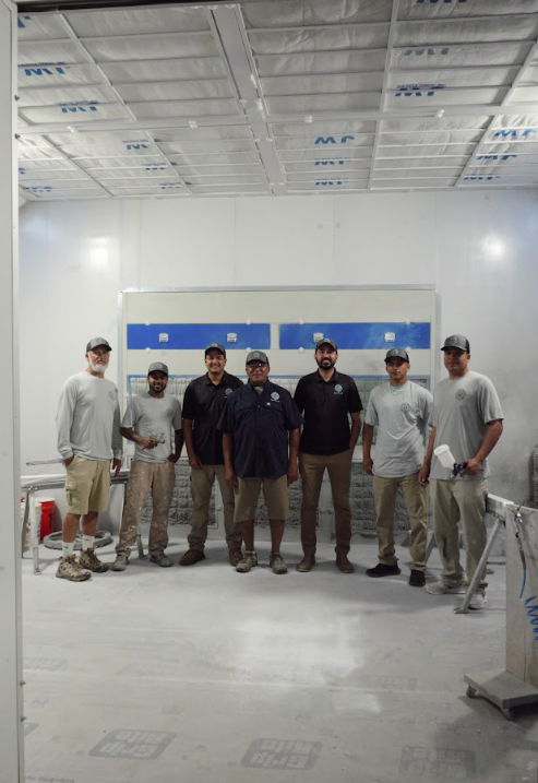 Ivan Junior, family members and the Compass Home Group crew at their Hyannis shop