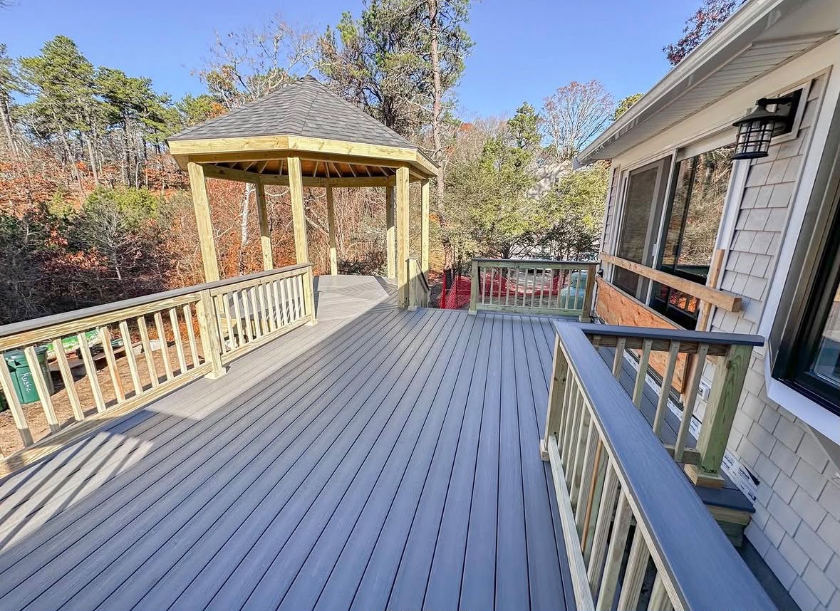 Completed residential wood deck with gazebo built for Cape Cod coastal conditions