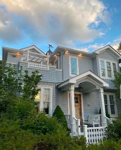 Completed Cape Cod home representing general contractor services by Compass Home Group
