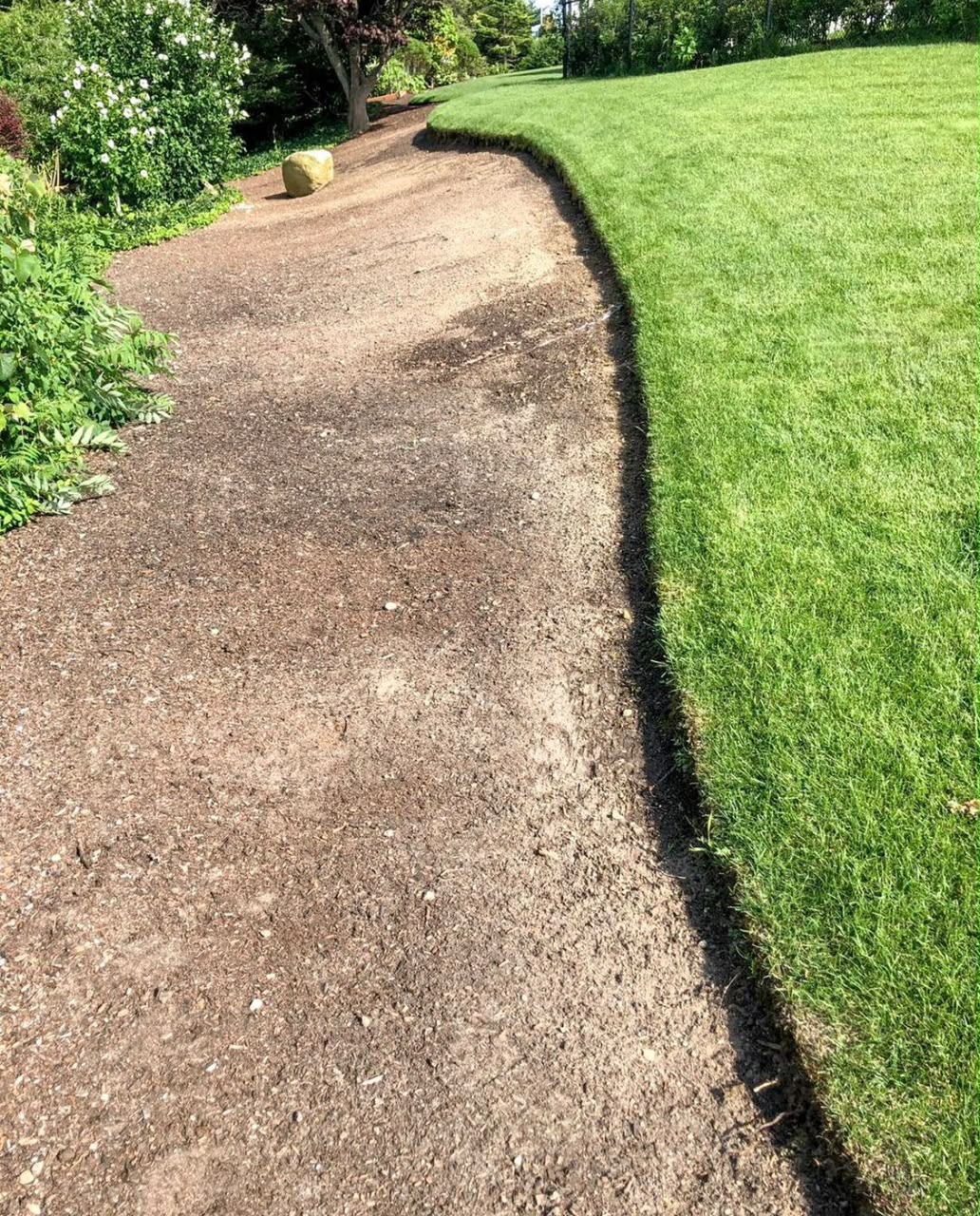 Professional base preparation for a landscaped walkway