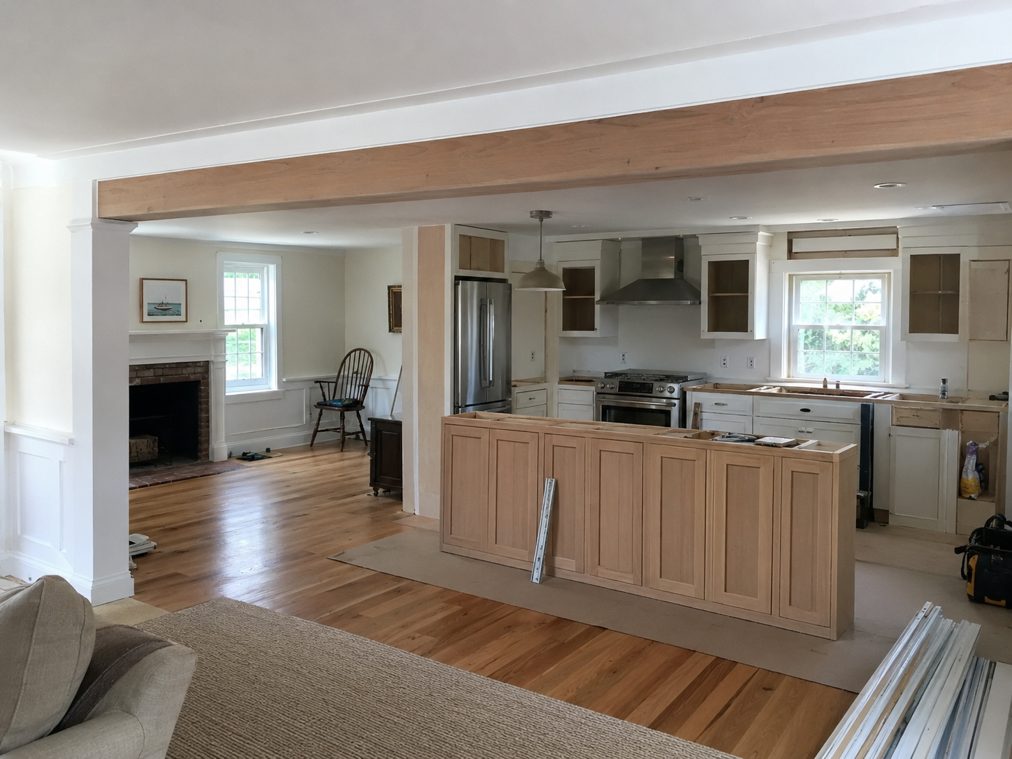 Open concept kitchen remodeling with an island in Cape Cod