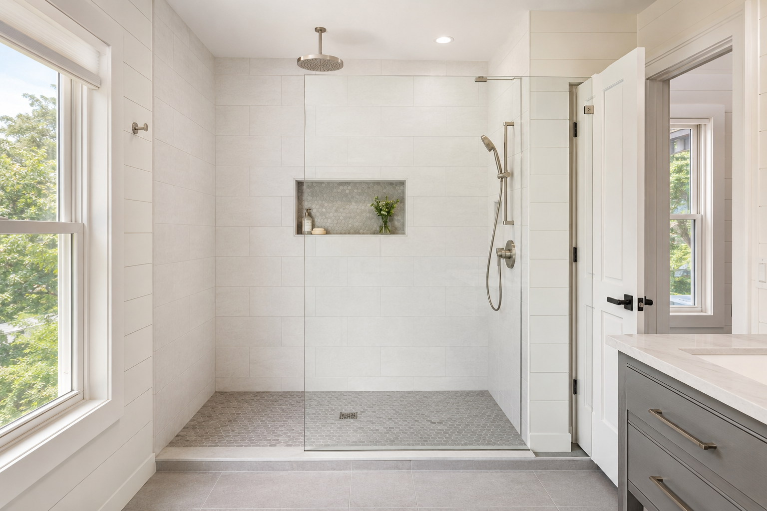 Custom walk in shower installation with tile and glass in a Cape Cod home